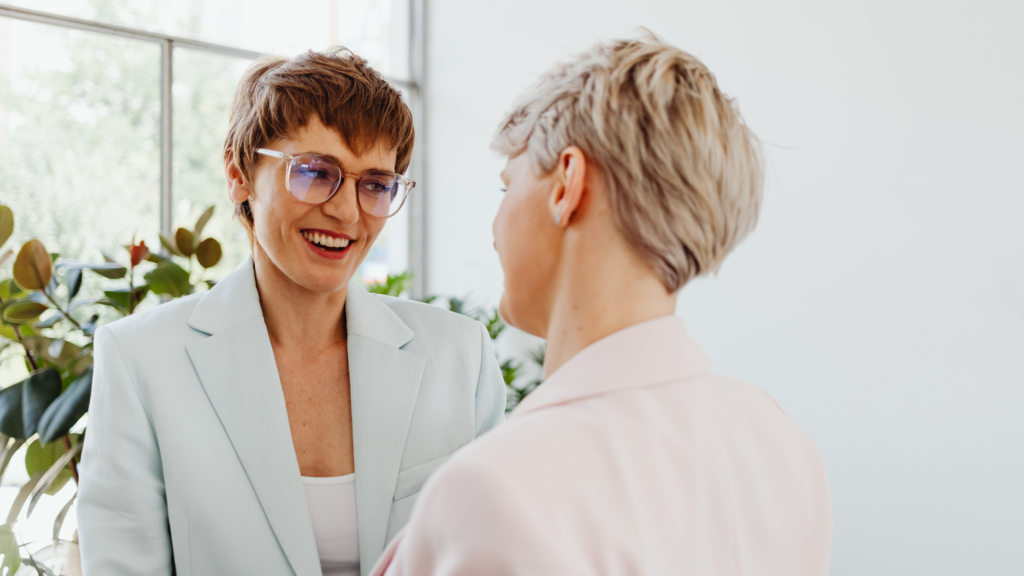 Hospitality business partners shaking hands to establish long-term sustainable collaborations